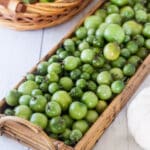 green tomatoes in bamboo basket