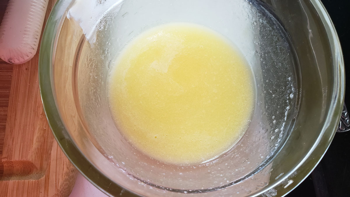 Melted butter in the glass bowl.