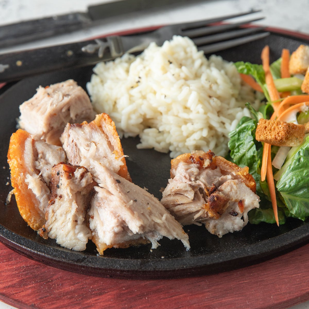 Juicy pieces of pork with crispy skin.