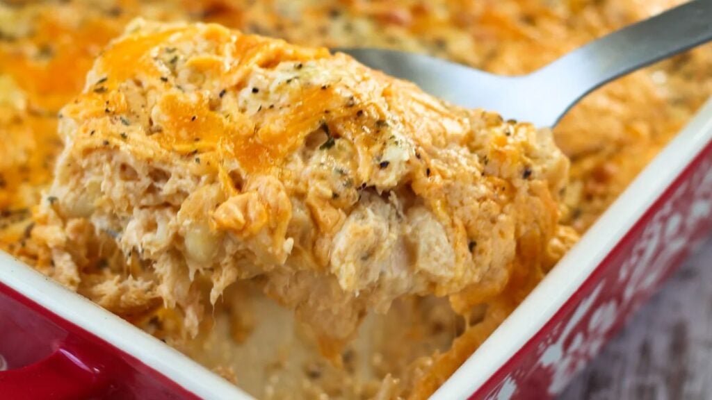 A spoonful of Buffalo Chicken Man and Cheese from a casserole.