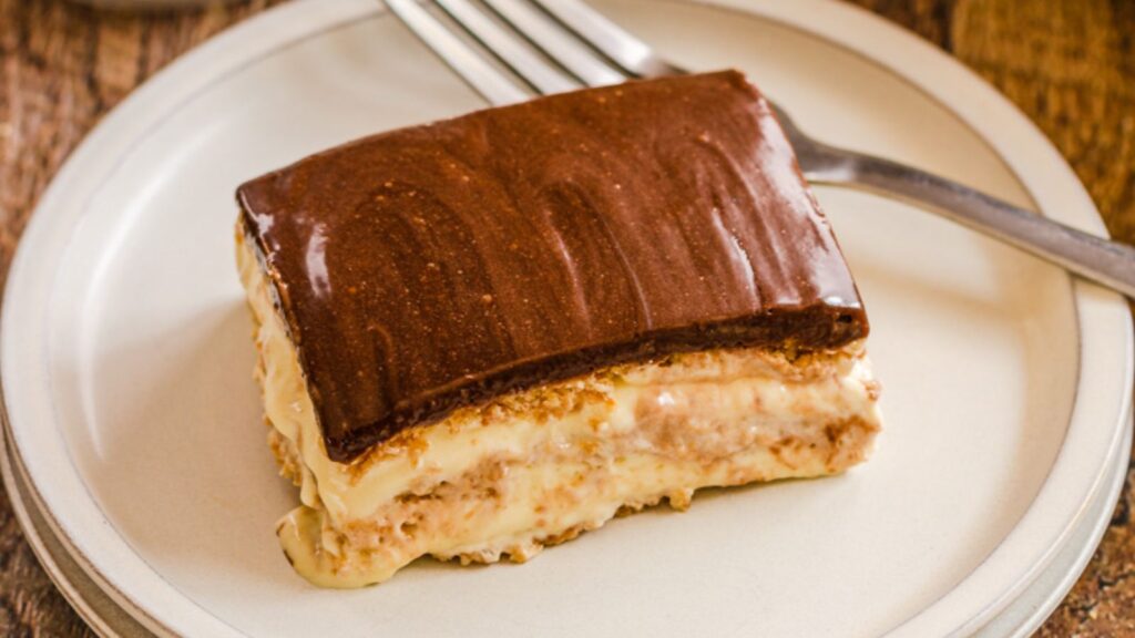 A slice of eclair cake on a plate.