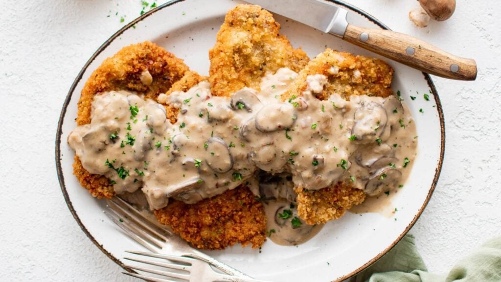 An overhead shot of Jagershcnitzel.