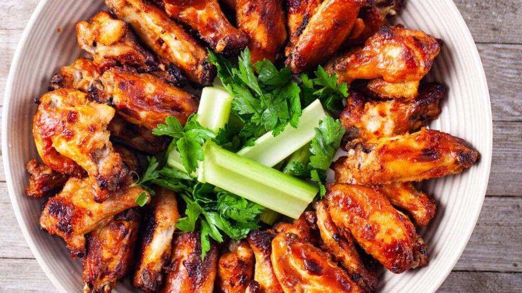 Chicken wings on a plate.