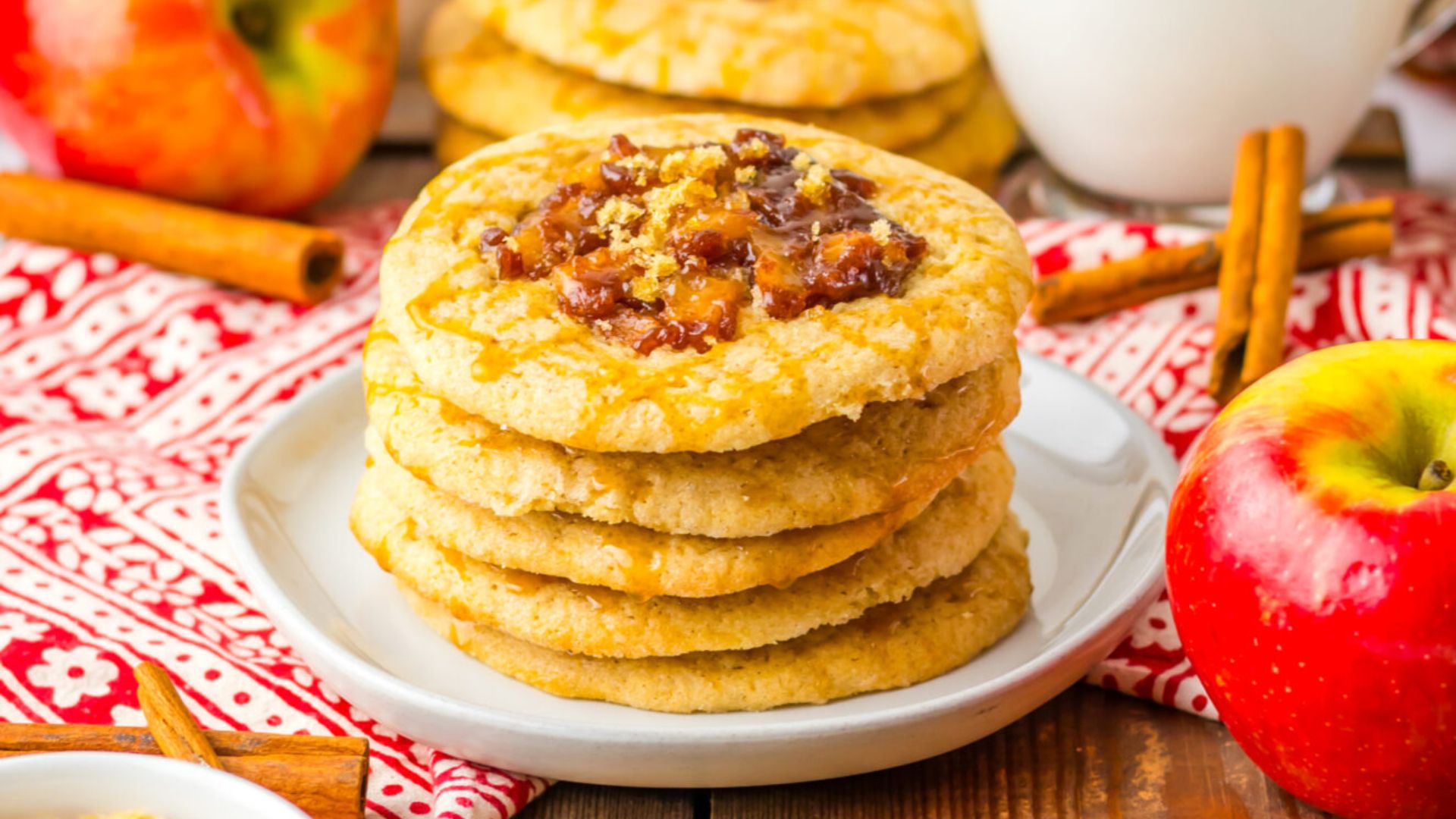 Stack of apple spice cookies on a plate.
