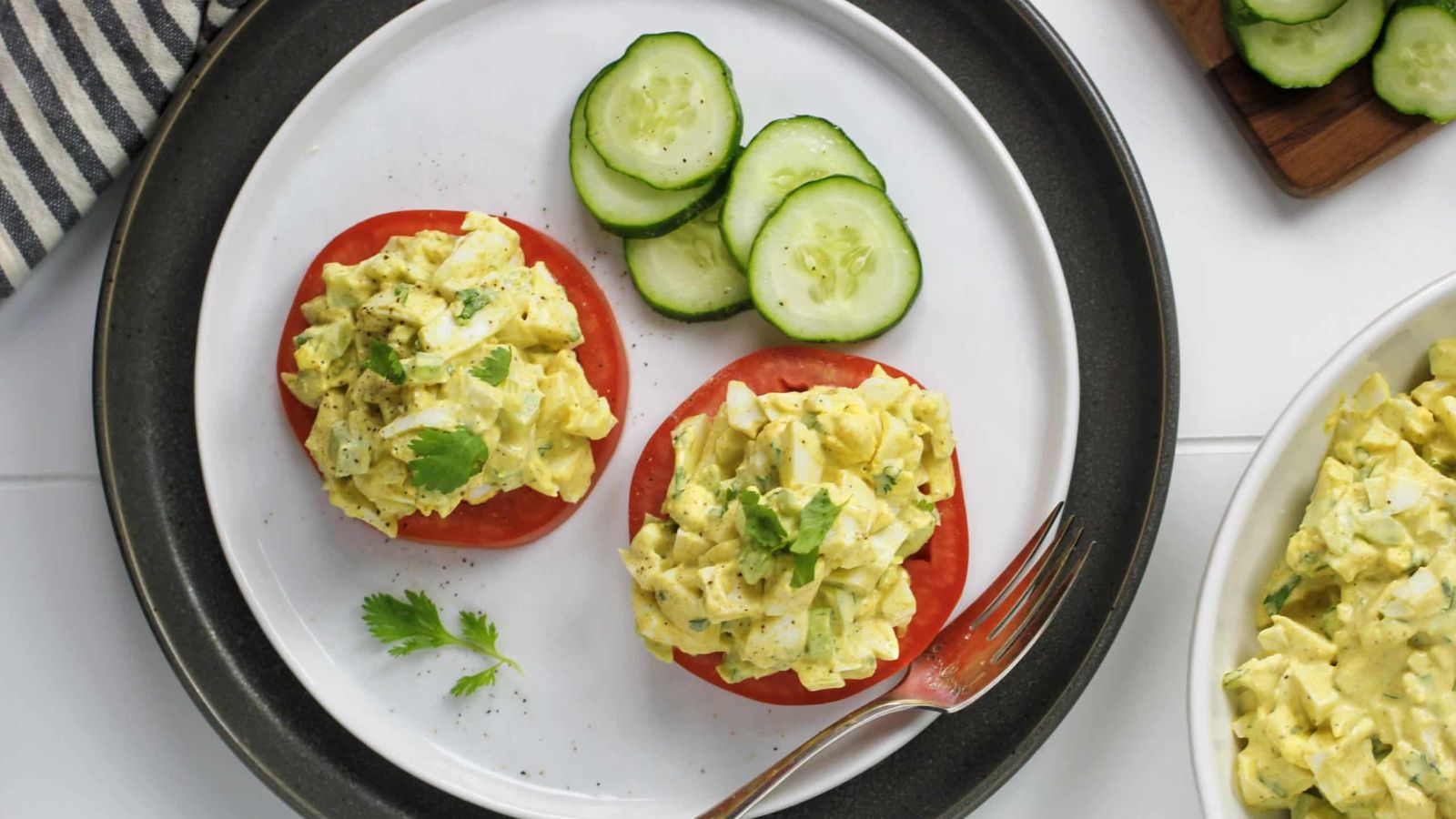 Curried egg salad in tomatoes.