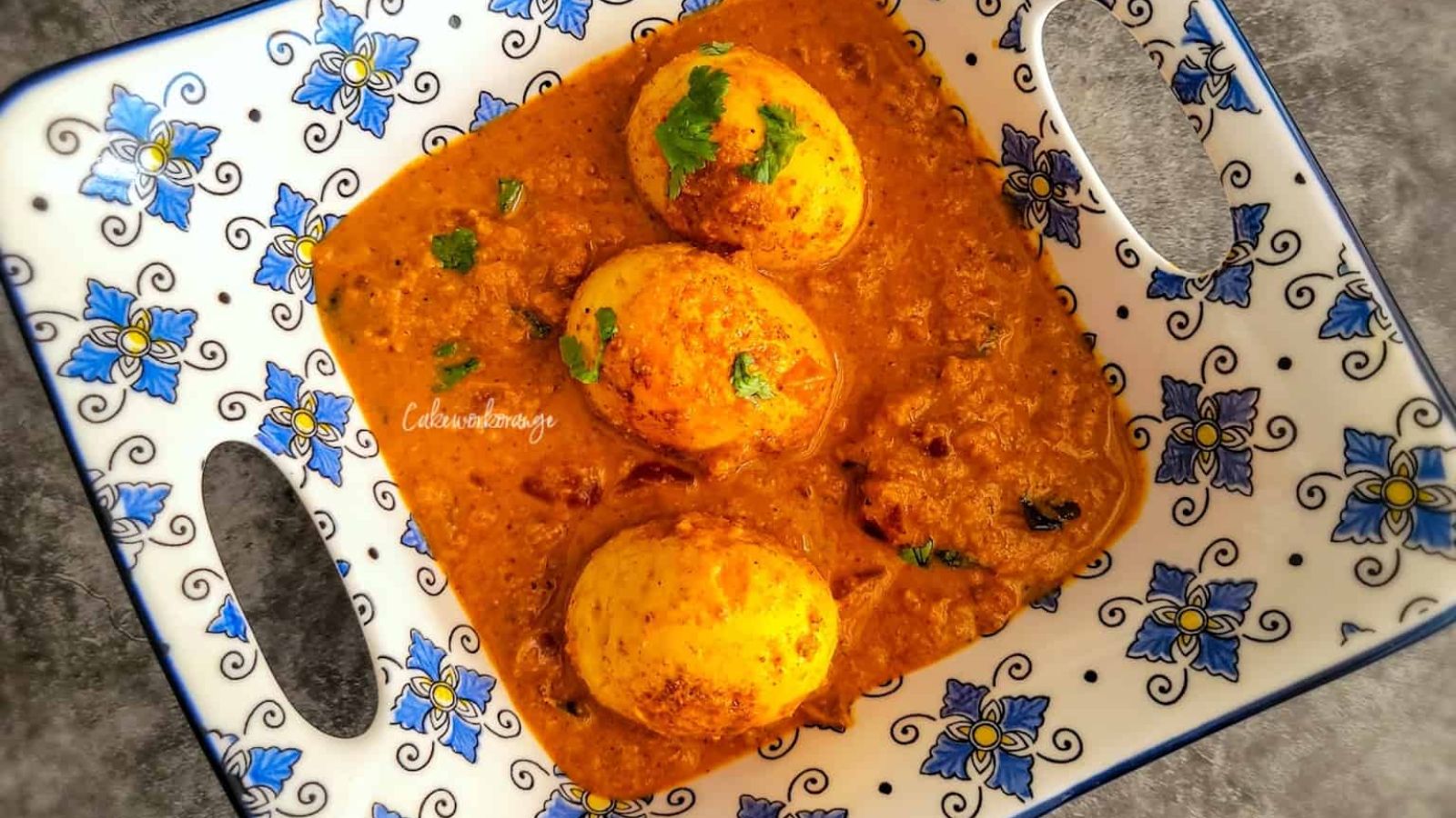 Egg curry on a plate.
