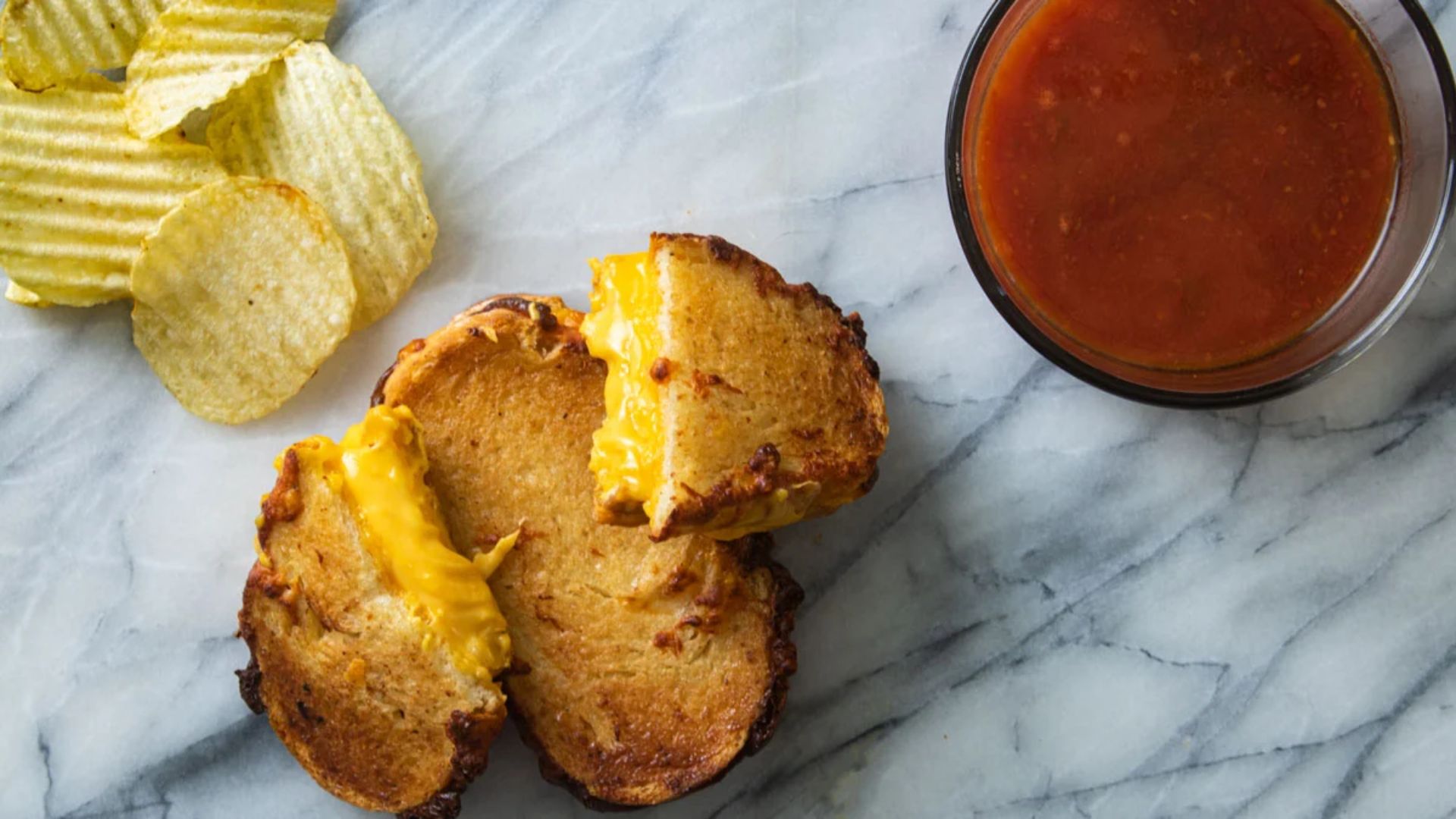 Grilled cheese with dip on the side.