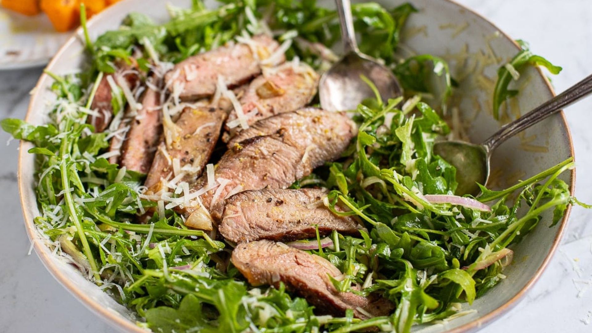 Salad with steak.