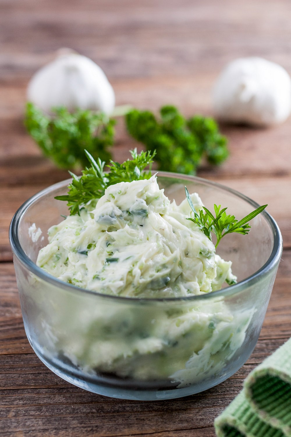 harvesting the garden -clear bowl with herbed garlic butter