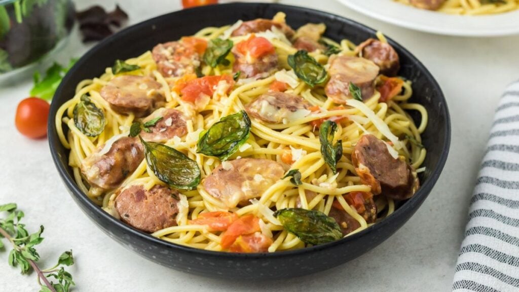 Chorizo Pasta And Fried Basil on a pan