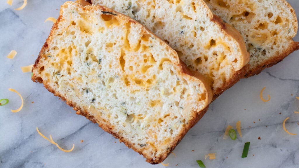 Close-up photo of slices of zucchini cheese bread