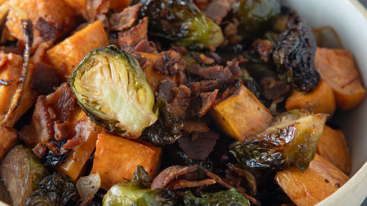 Roasted Brussels Sprouts and Sweet Potatoes in a bowl.