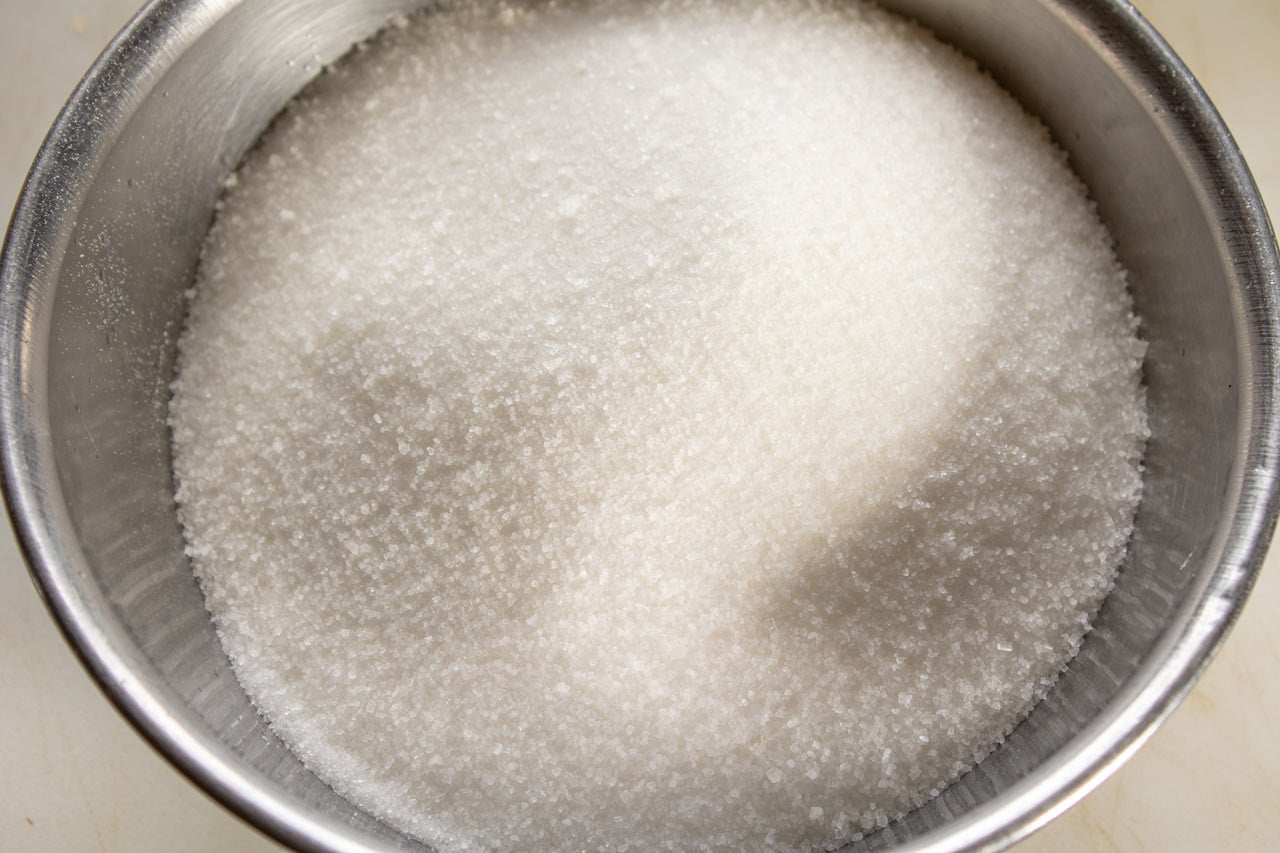 Sugar measured into a bowl.