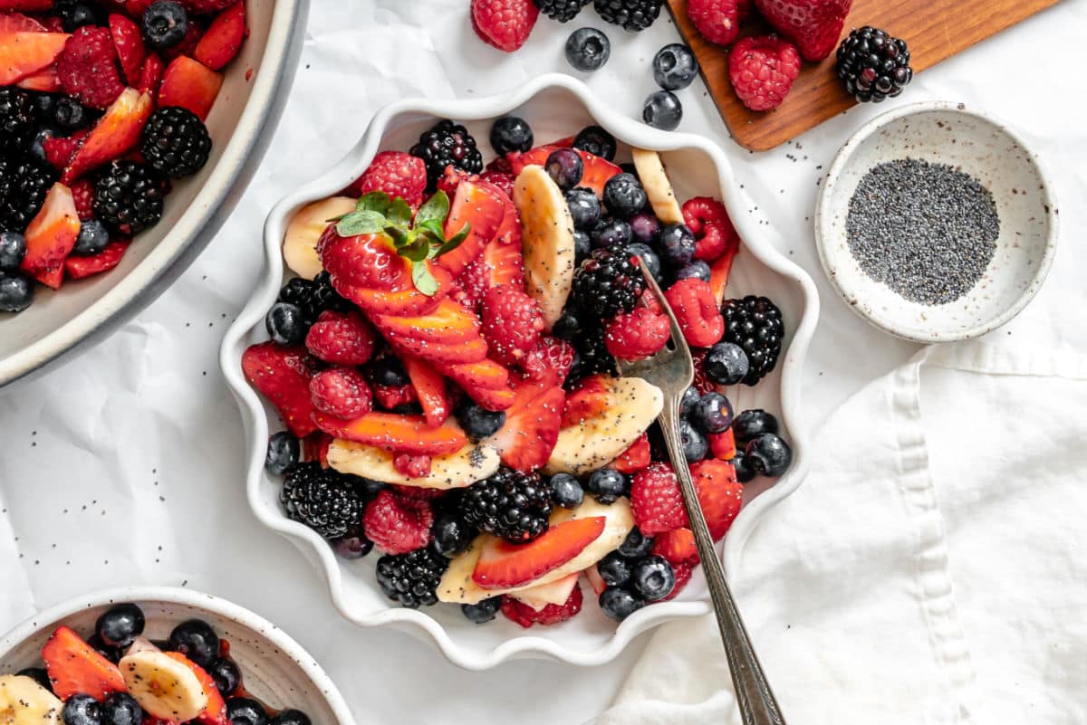 An overhead shot of a bowl of Poppy Seed Fruit Salad