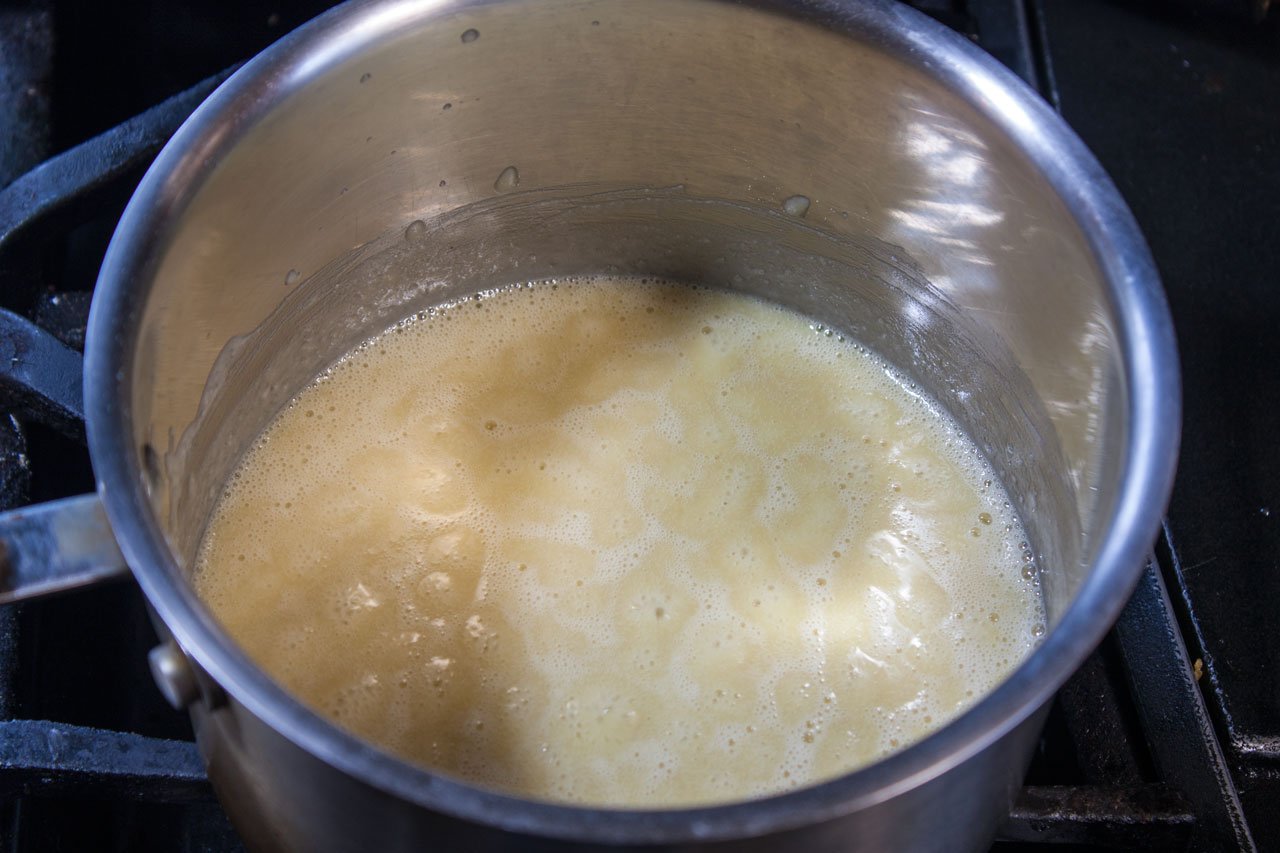 Melted butter in a saucepan.