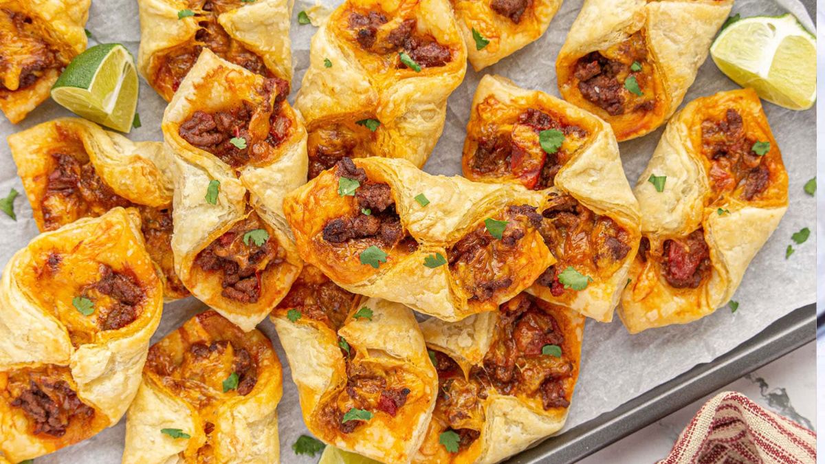 Puff Pastry tacos on baking sheet.