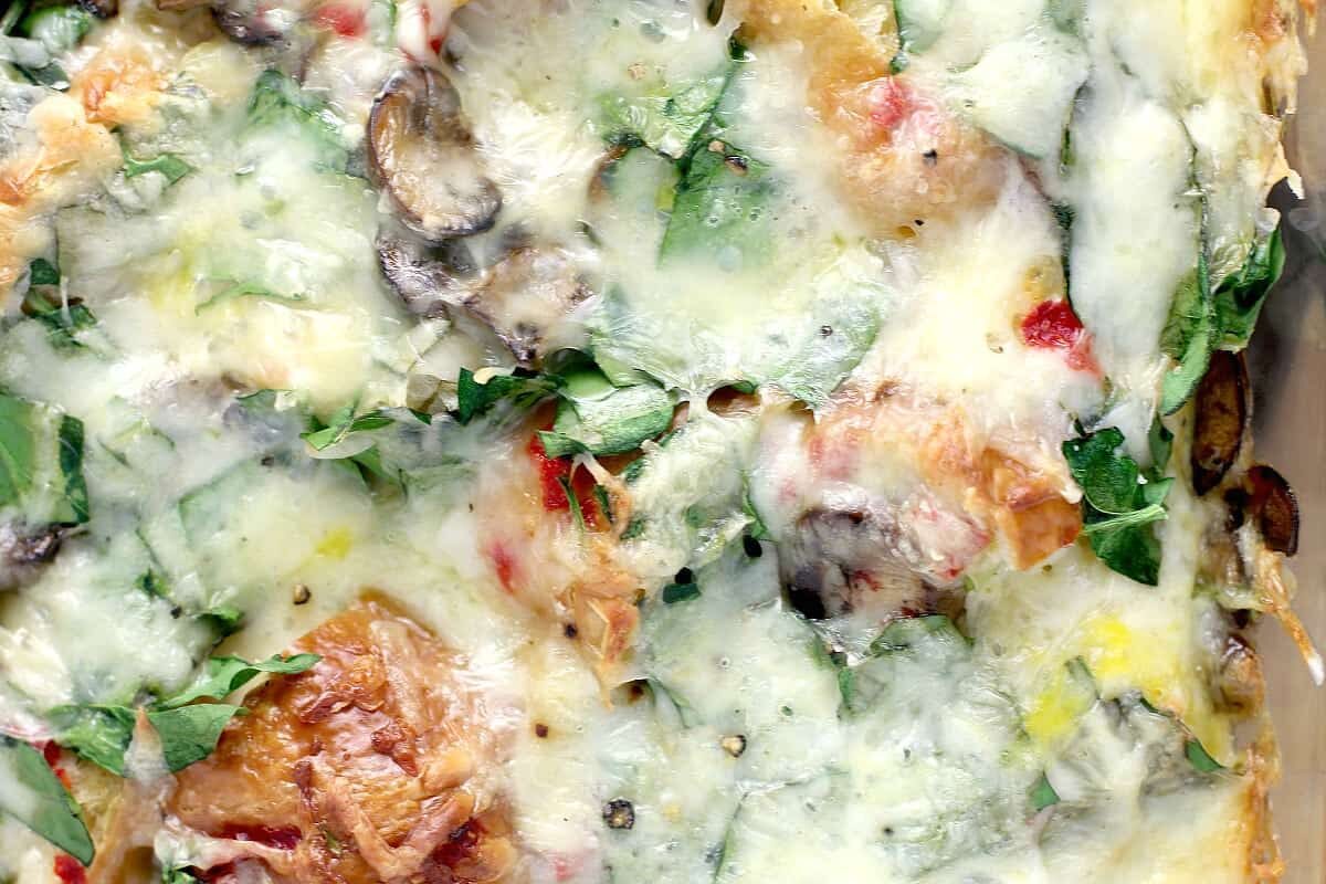 A close up shot of Christmas Croissant Breakfast Casserole