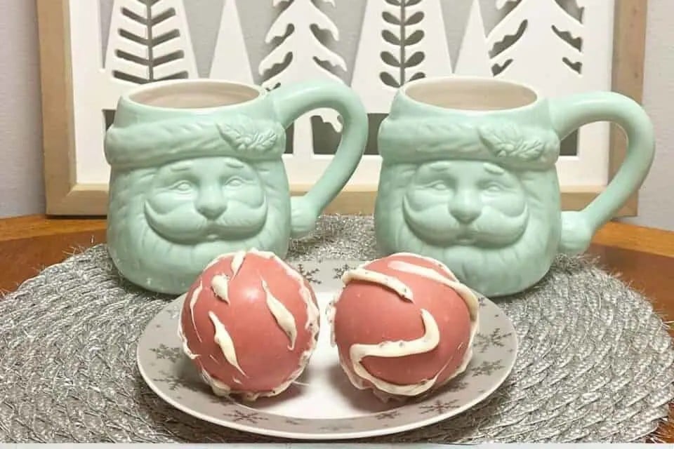 Two Hot Cocoa Bombs on a plate