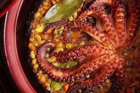 An overhead shot of Greek Octopus with Black Eyed Beans