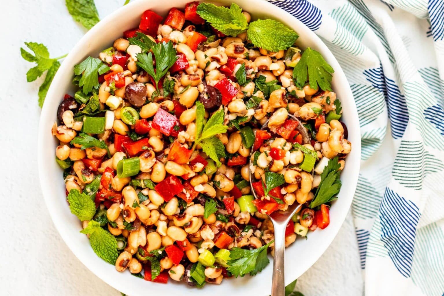 An overhead shot of Mediterranean Black Eyed Pea Salad with Fresh Herbs and Olives