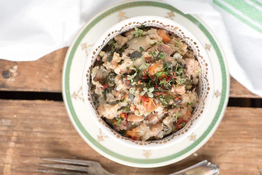 An overhead shot of a plate of Slow Cooker Lucky Black Eyed Peas and Ham {Hoppin John}