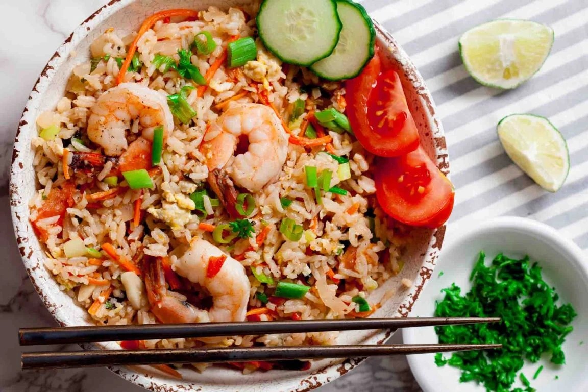 An overhead shot of a bowl of Thai Fried Rice