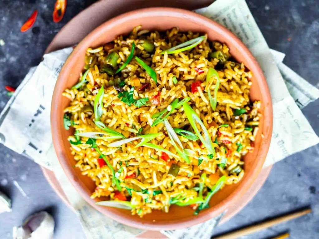 An overhead shot of a bowl of Chilli Garlic Fried Rice