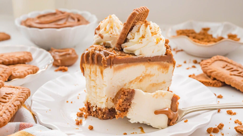 A slice of No-Bake Biscoff Cheesecake.