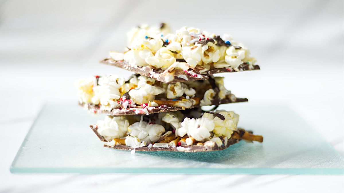 A stack of Almond Bark with Pretzels and Popcorn