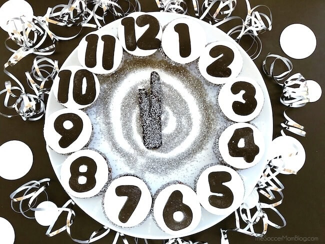 A ring of New Year's Eve Cupcakes with number fondants to look like a clock.