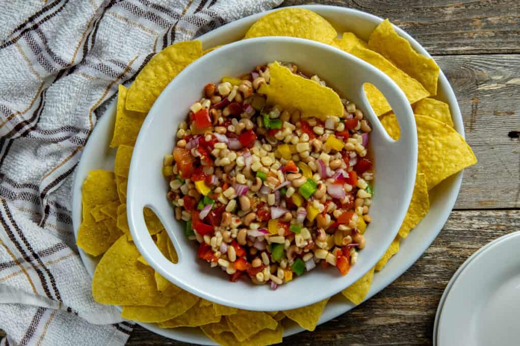 An overhead shot of Mississippi Caviar with chips on the side.