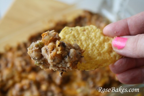 A chip dipped in Hot Black Eyed Pea Dip