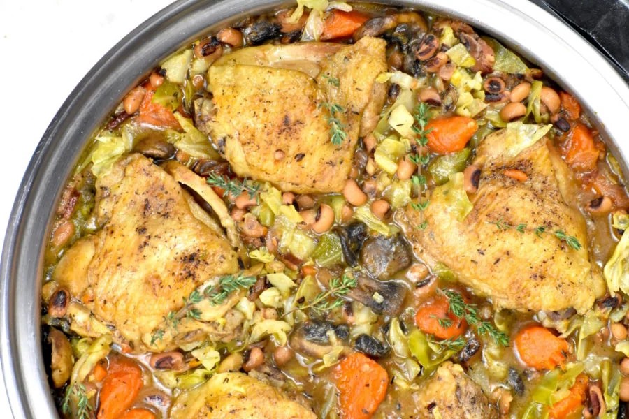 An overhead shot of Southern Braised Chicken with Black Eyed Peas.
