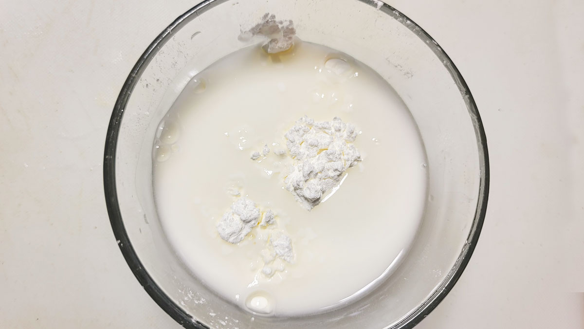 Cornstarch and water in a small bowl.