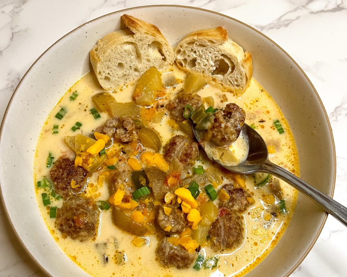An overhead shot of Cheesy Beer Brat Chowder
