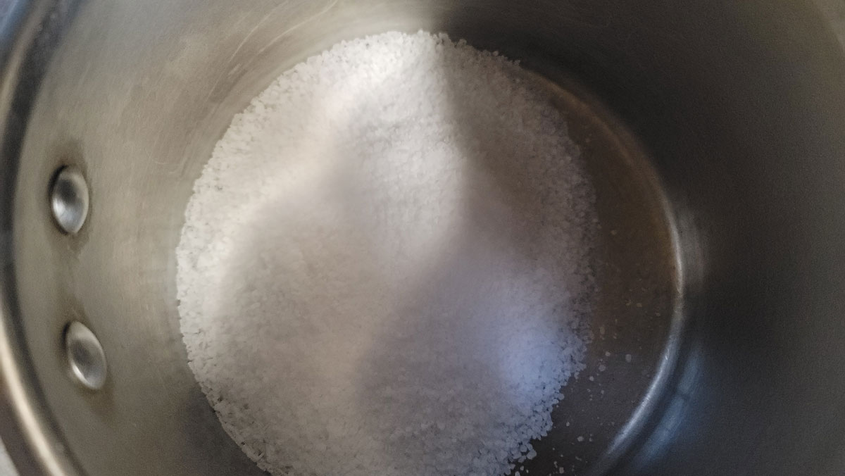 Salt in medium saucepan.