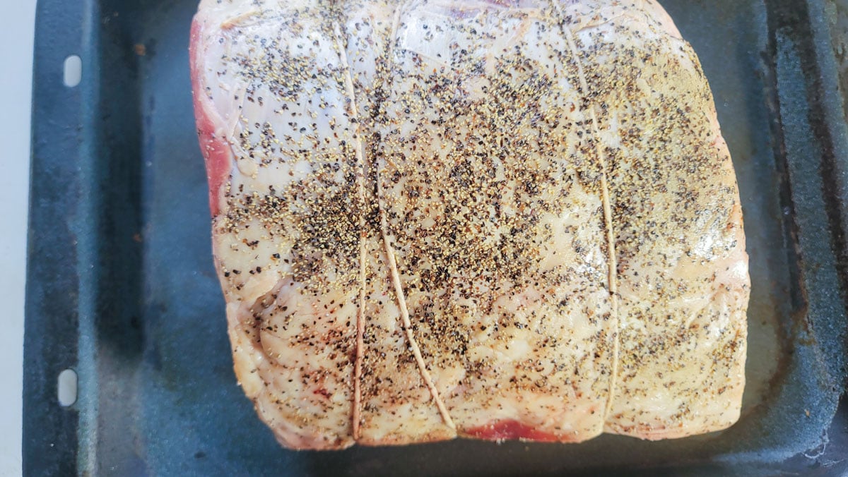 Rib roast seasoned and tied with butcher's twine
