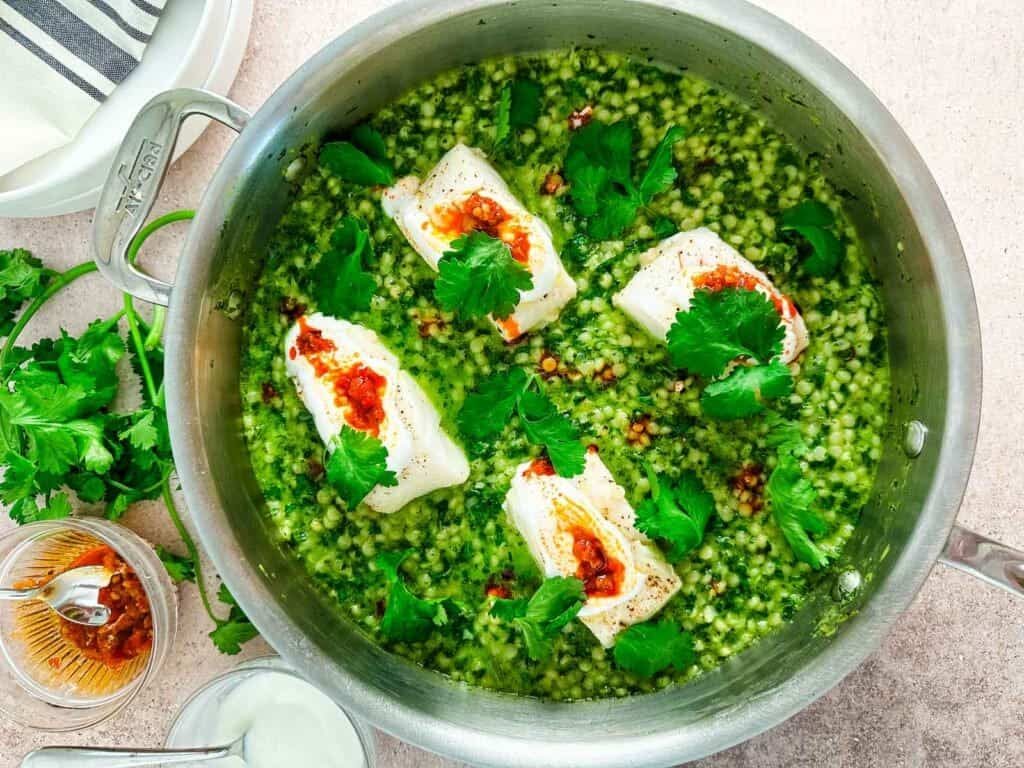 One Pan Steamed Cod with Herby Pearled Couscous