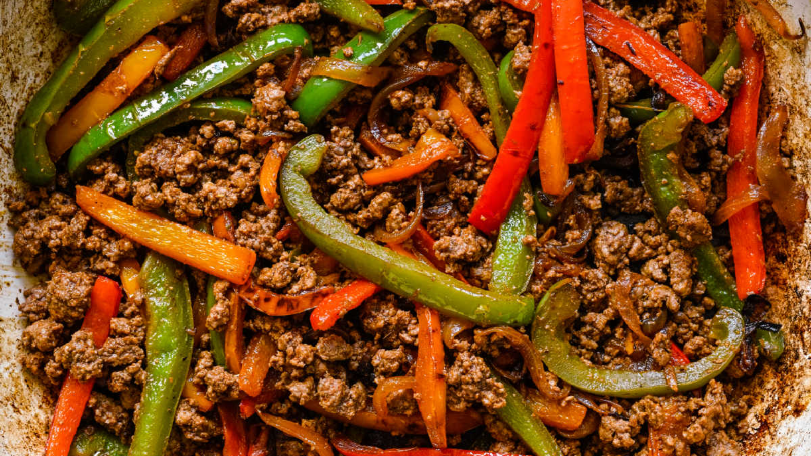 Ground beef fajita mixture in a Dutch oven.