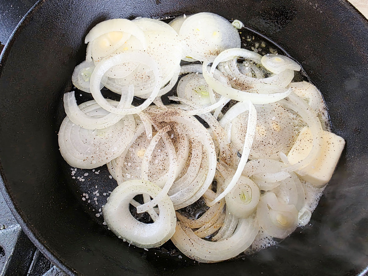 Salt and pepper added to the onions.