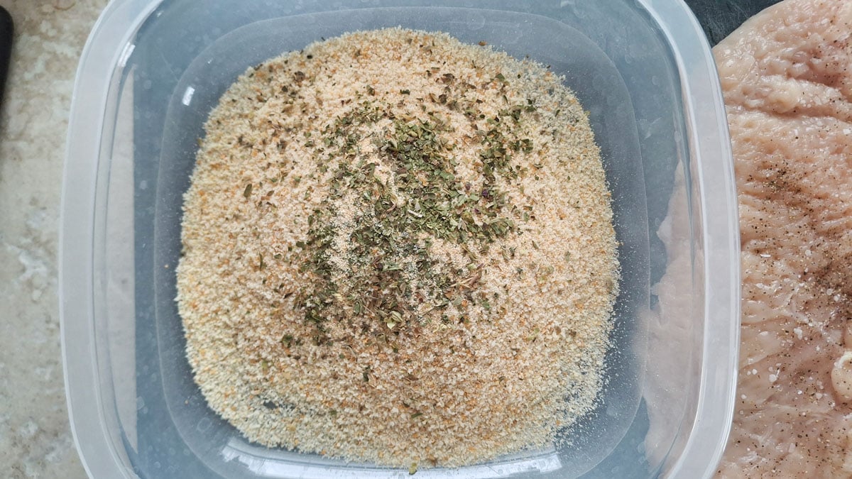 Bread crumbs and spices in a bowl.