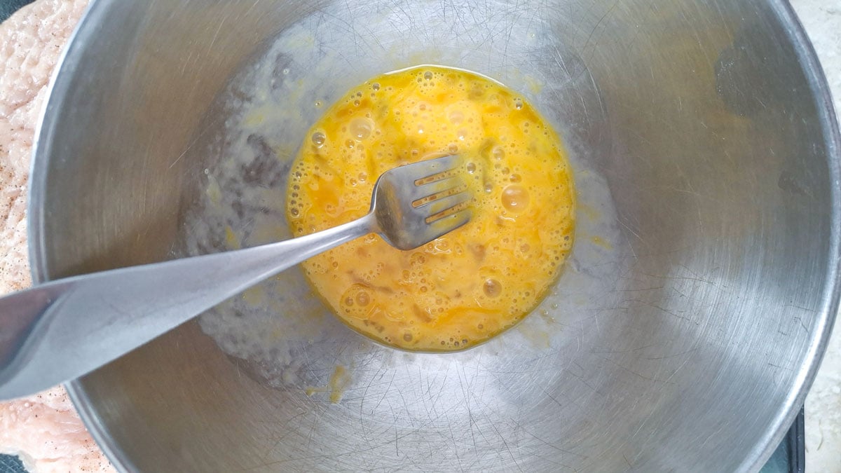 Scrambled eggs in a bowl.