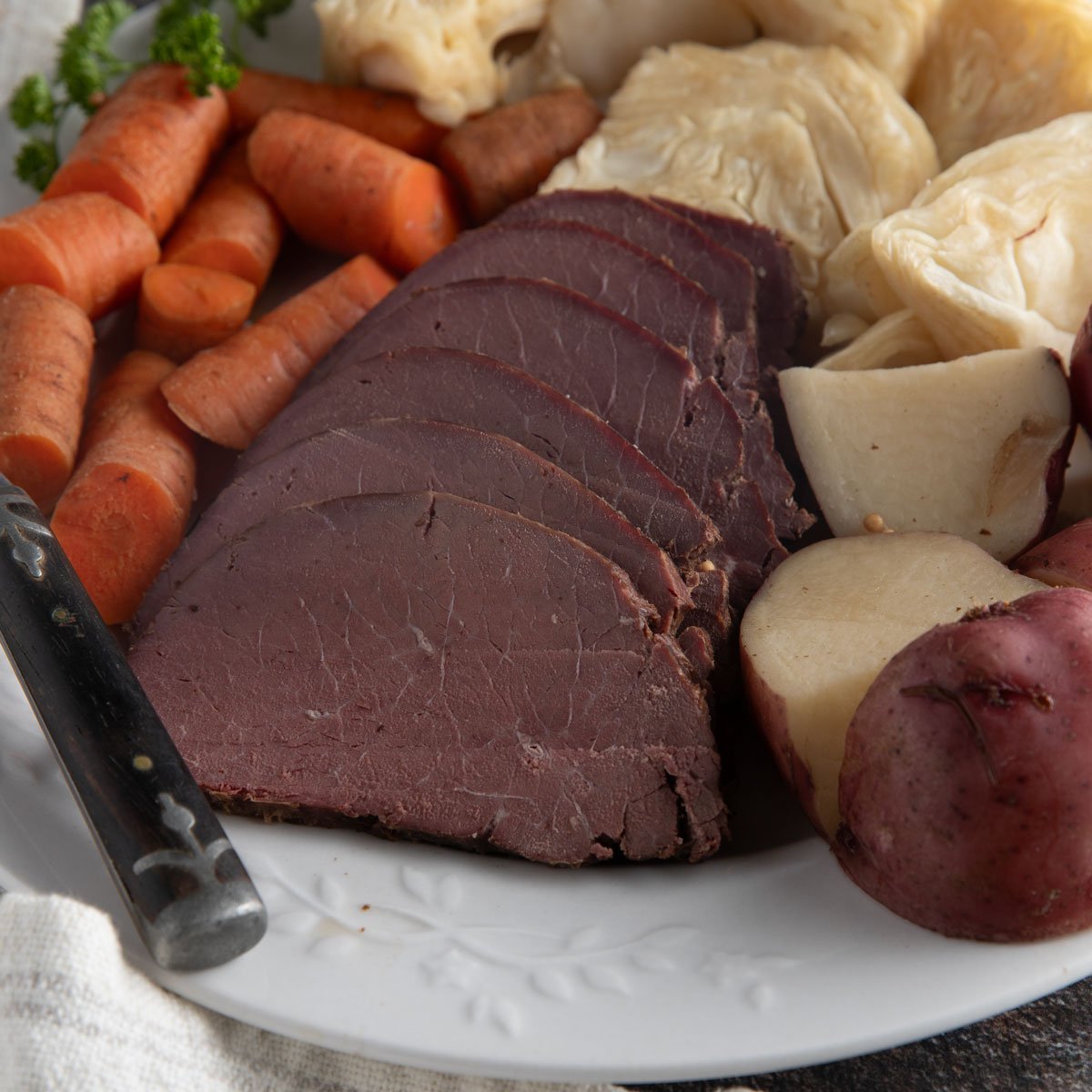 corned venison and cabbage with potatoes and carrots.