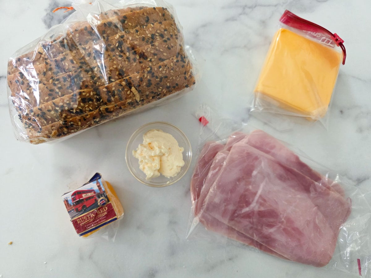 Ingredients for ham and cheese grilled cheese. See details in the recipe below.