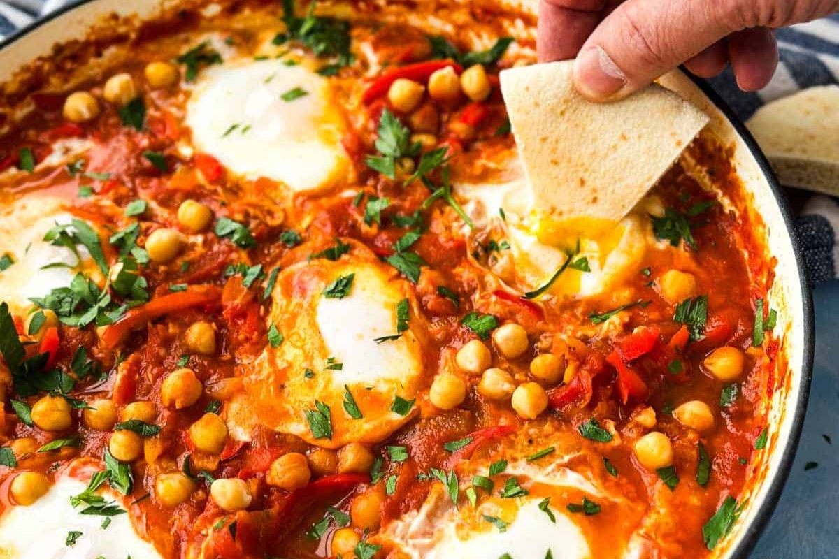 Moroccan Shakshuka (poached eggs in spicy tomato sauce)