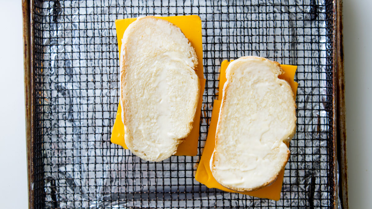 Cheese topped with second piece of bread.