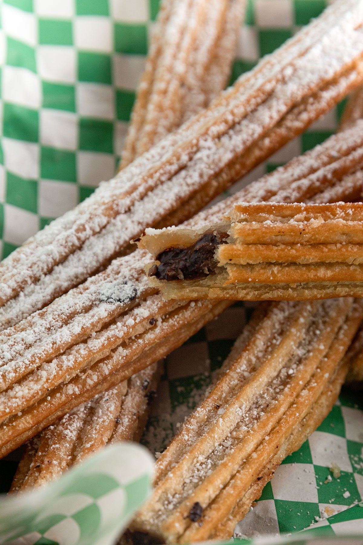 Broken air fryer churro to expose the chocolate filling.