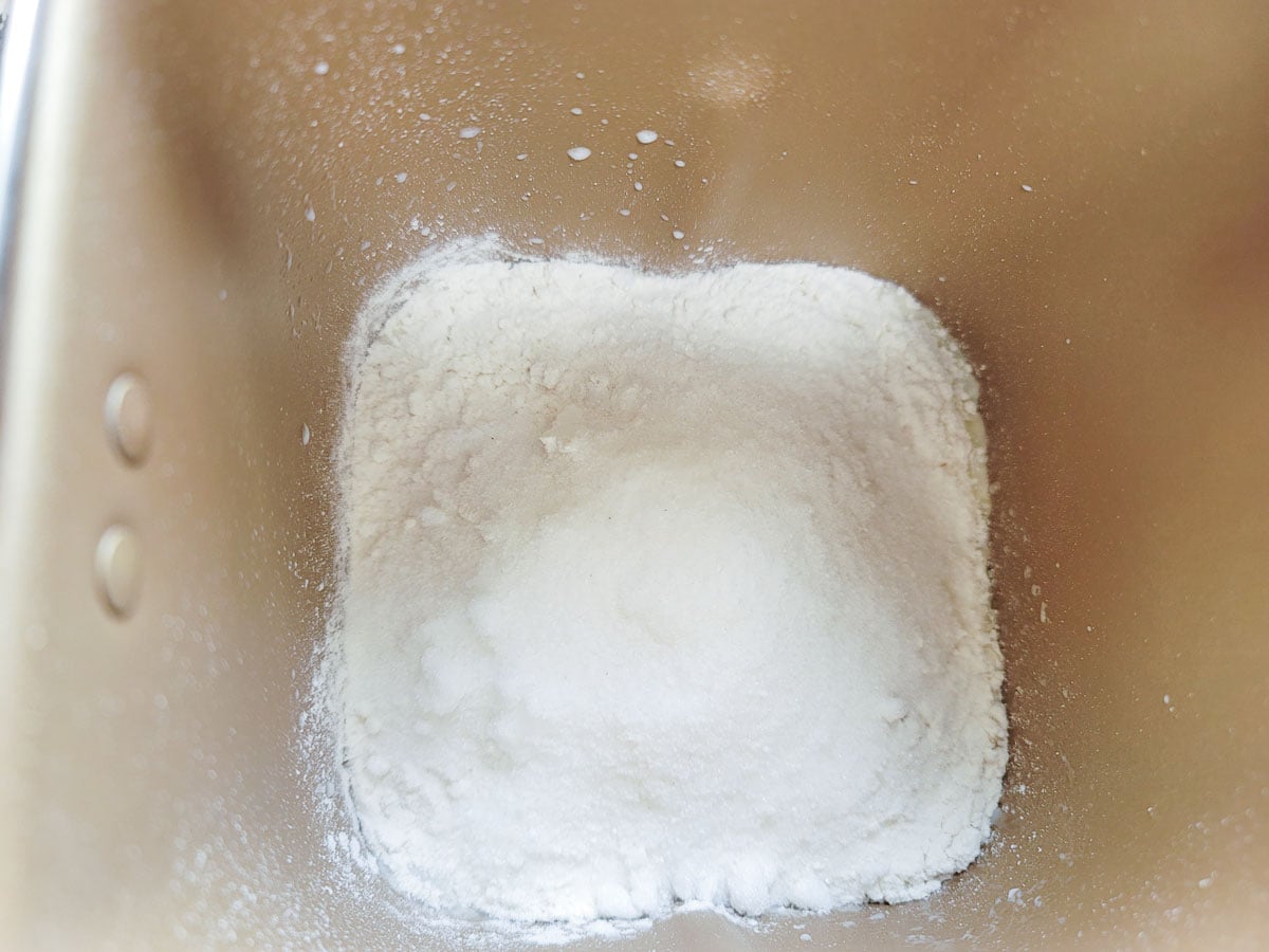 Flour and salt added to the bread machine.