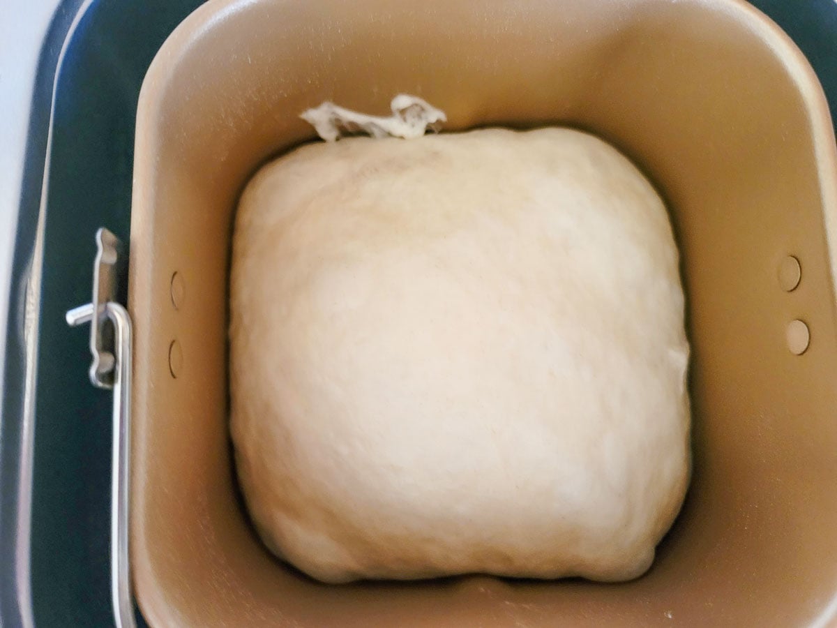 Kneaded dough in the bread machine.