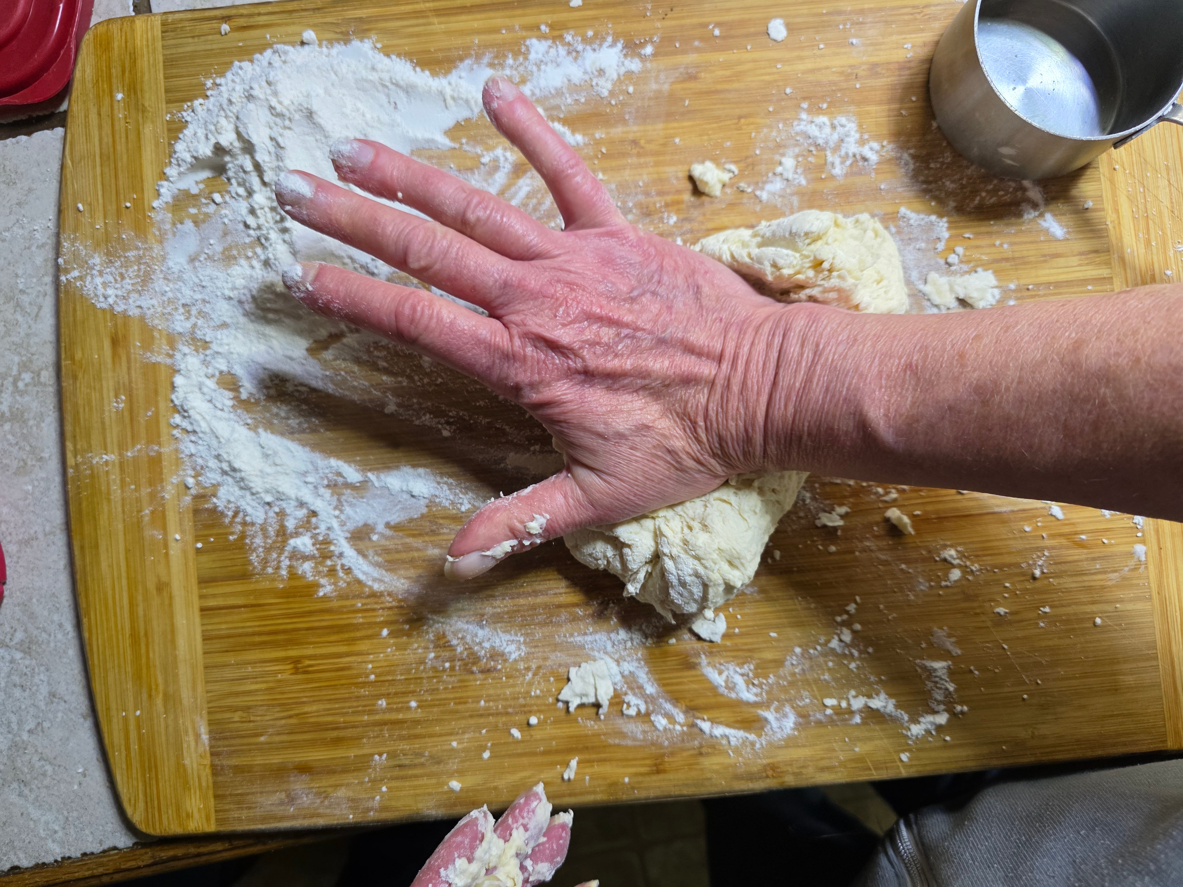 Kneading the sopapilla dough.